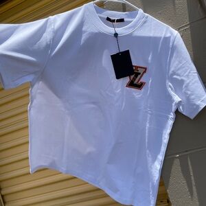 Louis Vuitton Tshirt Size M brand new free if you buy full sweatsuit or $500